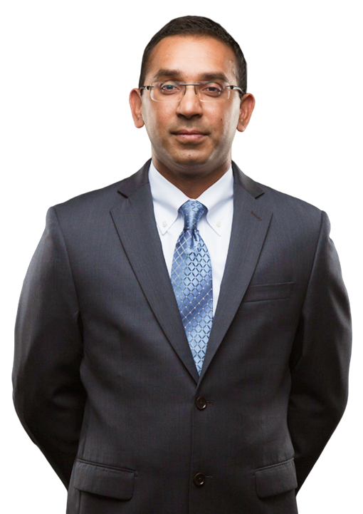 Doctor in suit with arms crossed
